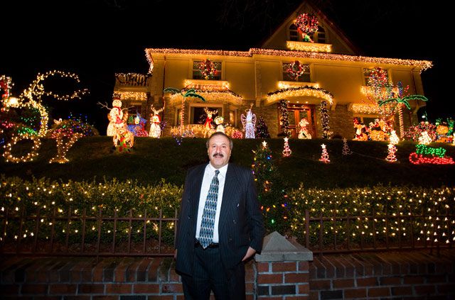 Bay Ridge resident Sam Maloof standing in front of his house.